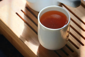 Porcelain Tea Cup with Chinese Jian-Style Glaze for Zen Moments